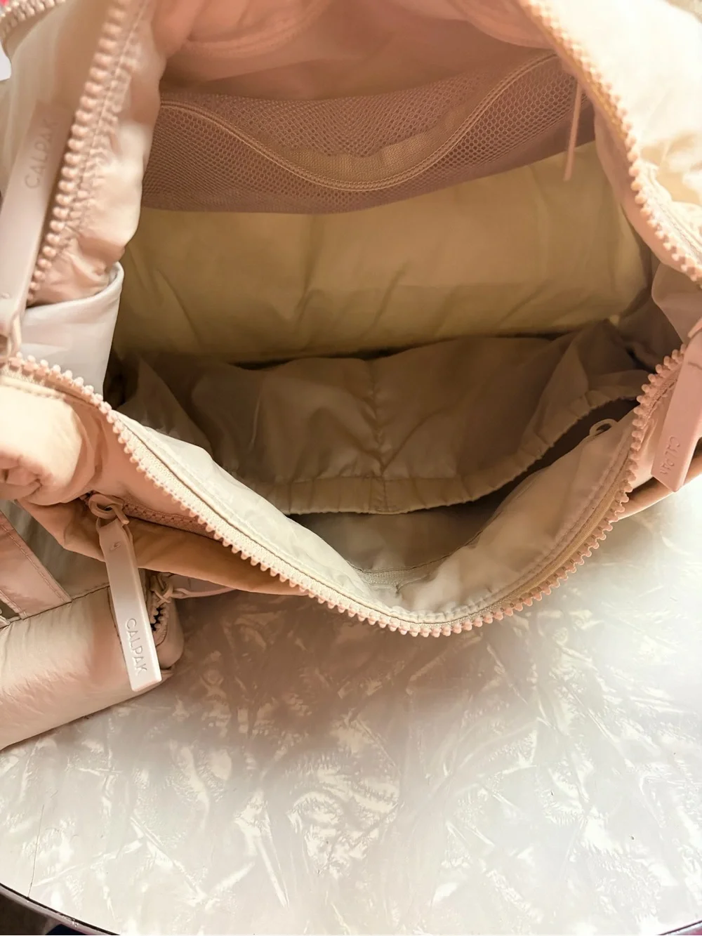 Calpak Crossbody diaper bag AND pacifier pouch in oatmeal